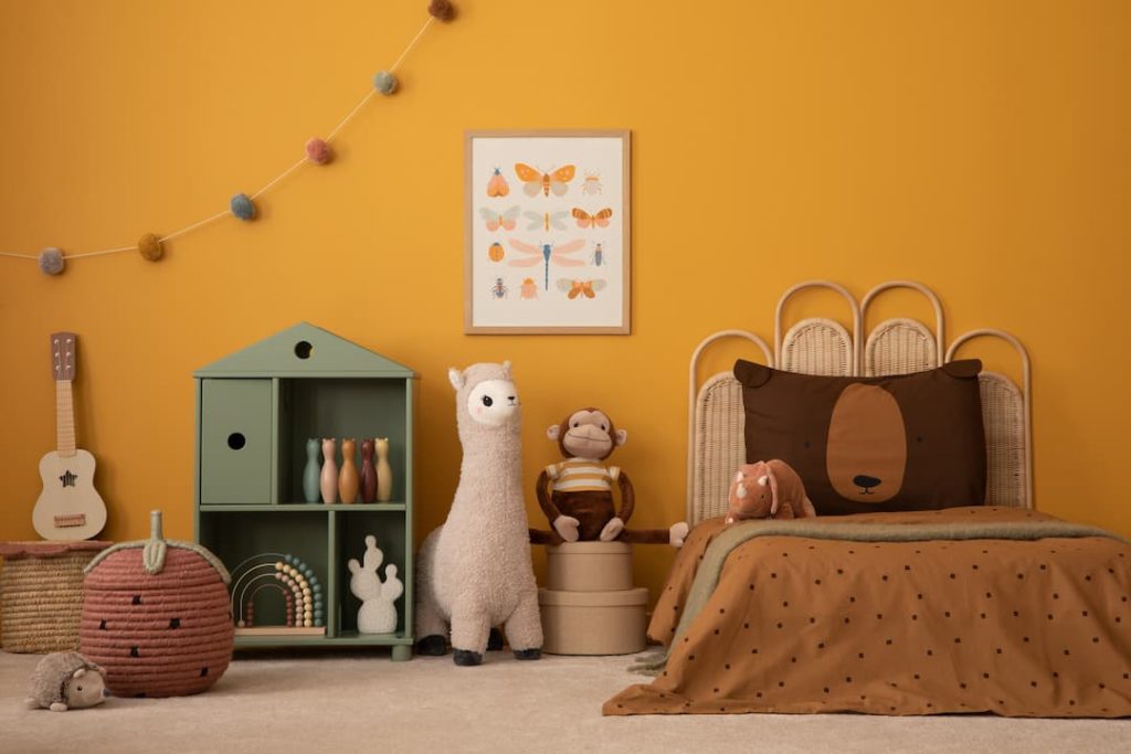 children's bedroom with bright walls and beige carpets